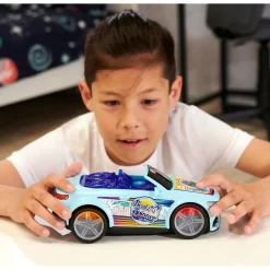 FUNKO UK LIMITED Vehículos Y Circuitos*Coche de juguete con luces intermitentes, música y giros, incluye pilas ㅤ